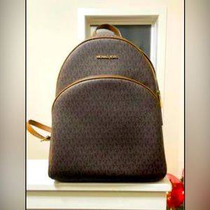 Michael Kors backpack and long wallet